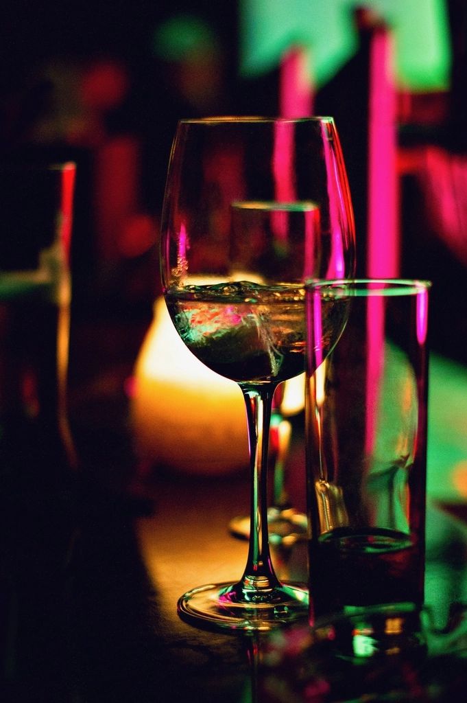 A cocktail being finished at the bar