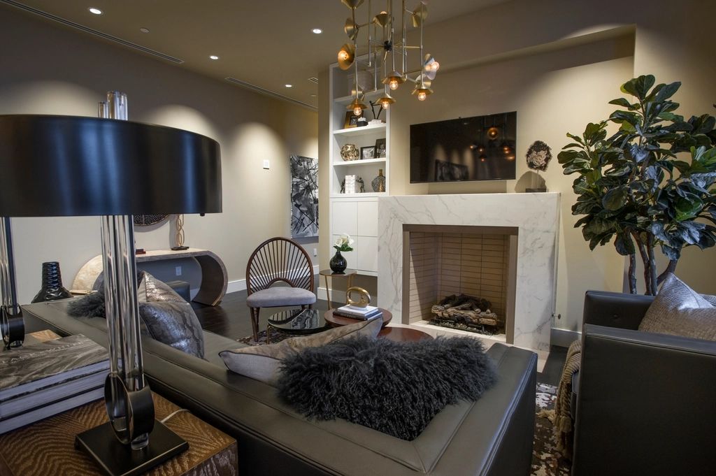 A suite sitting room with a sofa and armchairs